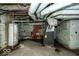 Unfinished basement with exposed pipes and HVAC unit at 819 E 49Th St, Indianapolis, IN 46205