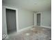 Empty bedroom with gray walls and hardwood floors at 819 E 49Th St, Indianapolis, IN 46205