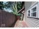 Small side deck with access to backyard at 819 E 49Th St, Indianapolis, IN 46205