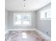 Well-lit bedroom with freshly painted walls and hardwood floors at 819 E 49Th St, Indianapolis, IN 46205