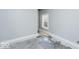 A simple bedroom with painted walls and baseboards, awaiting flooring at 819 E 49Th St, Indianapolis, IN 46205