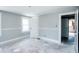 Empty bedroom with gray walls, hardwood floors, and closet at 819 E 49Th St, Indianapolis, IN 46205