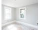 Bright bedroom with new paint and two windows at 819 E 49Th St, Indianapolis, IN 46205