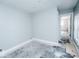 A simple bedroom with painted walls and baseboards, awaiting flooring at 819 E 49Th St, Indianapolis, IN 46205