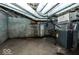 Unfinished basement with exposed pipes and HVAC unit at 819 E 49Th St, Indianapolis, IN 46205