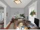 Bright home office features a large L-shaped desk, ample storage, and plenty of natural light at 621 N State St, Greenfield, IN 46140