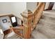 Close-up of ornately carved wooden staircase newel post at 621 N State St, Greenfield, IN 46140
