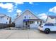 House exterior with blue awning, parking and ramp at 621 N State St, Greenfield, IN 46140