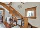 Elegant wooden staircase with detailed banister and landing at 621 N State St, Greenfield, IN 46140