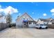 House exterior with blue awning and parking at 621 N State St, Greenfield, IN 46140