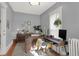 Bright home office features a large L-shaped desk, ample storage, and plenty of natural light at 621 N State St, Greenfield, IN 46140