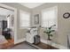 Small office space with printer, shredder, and a large plant at 621 N State St, Greenfield, IN 46140