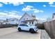 House exterior with blue awning, parking, and ramp at 621 N State St, Greenfield, IN 46140