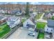 Aerial view showcasing a house with a spacious parking area at 621 N State St, Greenfield, IN 46140