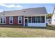 Red house exterior with screened porch and gray roof at 3938 Holly Brook Dr, Westfield, IN 46074