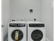 Convenient laundry room with a washer and dryer at 319 E 16Th St # 202, Indianapolis, IN 46202