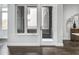 White door leading to a private balcony with dark gray walls at 319 E 16Th St # 202, Indianapolis, IN 46202