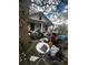 House with cluttered front yard and significant debris at 904 N Penn St, Muncie, IN 47303