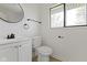 Clean bathroom with white vanity and fixtures at 7308 Forest Park Dr, Indianapolis, IN 46217