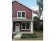 Red two-story duplex with white door and trim at 217 N Temple Ave, Indianapolis, IN 46201