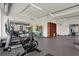 Fitness center with cardio equipment and large windows at 855 N East St # 303-B, Indianapolis, IN 46202