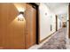Modern hallway with wood floors and neutral walls at 855 N East St # 303-B, Indianapolis, IN 46202
