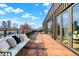 Large rooftop deck features city views and access to the interior at 855 N East St # 303-B, Indianapolis, IN 46202