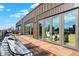 Expansive rooftop deck with city views and modern patio furniture at 855 N East St # 303-B, Indianapolis, IN 46202