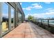 Spacious rooftop deck with city views and modern patio furniture at 855 N East St # 303-B, Indianapolis, IN 46202