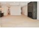 Open living room with hardwood floors, high ceilings and fireplace at 6621 Flowstone Way, Indianapolis, IN 46237