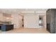 Modern kitchen with a large island, white cabinets and black countertops at 6621 Flowstone Way, Indianapolis, IN 46237