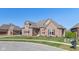 Brick house with gray roof, landscaping, and a mailbox at 4212 Stone Lake Dr, Zionsville, IN 46077