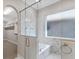 Bathroom with marble shower, soaking tub, and walk-in closet at 4212 Stone Lake Dr, Zionsville, IN 46077