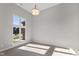Bright home office with a large window and neutral walls at 4212 Stone Lake Dr, Zionsville, IN 46077