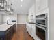 Modern kitchen features stainless steel appliances and a large island at 4212 Stone Lake Dr, Zionsville, IN 46077