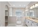 Spa-like bathroom featuring marble finishes and a walk-in shower at 4212 Stone Lake Dr, Zionsville, IN 46077