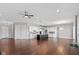 Open concept kitchen with island and white cabinets at 4212 Stone Lake Dr, Zionsville, IN 46077