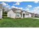 Ranch home with a two-car garage and manicured lawn at 2684 Lanai Ln, Greenwood, IN 46143
