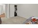 Bedroom with a twin bed, closet, and carpeted floor at 2684 Lanai Ln, Greenwood, IN 46143