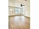 Spacious living area with hardwood floors and neutral walls at 221 N Temple Ave, Indianapolis, IN 46201