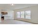 Open dining room with kitchen view and hardwood floor at 3712 Windstar Ct, Columbus, IN 47203