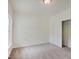 Simple bedroom with neutral walls and carpeting, and a closet at 3712 Windstar Ct, Columbus, IN 47203