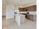 Kitchen features an island and stainless steel appliances at 3712 Windstar Ct, Columbus, IN 47203