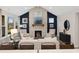 Living room with stone fireplace and comfortable seating area at 0 E 239Th St, Noblesville, IN 46060