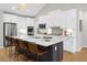 Modern kitchen with white cabinets, large island and stainless steel appliances at 0 E 239Th St, Noblesville, IN 46060