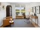 Bright home office with built-in desk and seating area at 0 E 239Th St, Noblesville, IN 46060