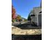 Row of new construction homes on a tree-lined street at 855 E Harrison St, Martinsville, IN 46151