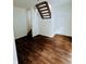 Finished basement with staircase and neutral flooring at 221 Kansas St, Indianapolis, IN 46225