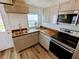 Modern kitchen with stainless steel appliances and butcher block countertops at 221 Kansas St, Indianapolis, IN 46225