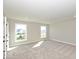 Bright bedroom with neutral carpeting and large windows at 15269 Garden Mist Pl, Fishers, IN 46037